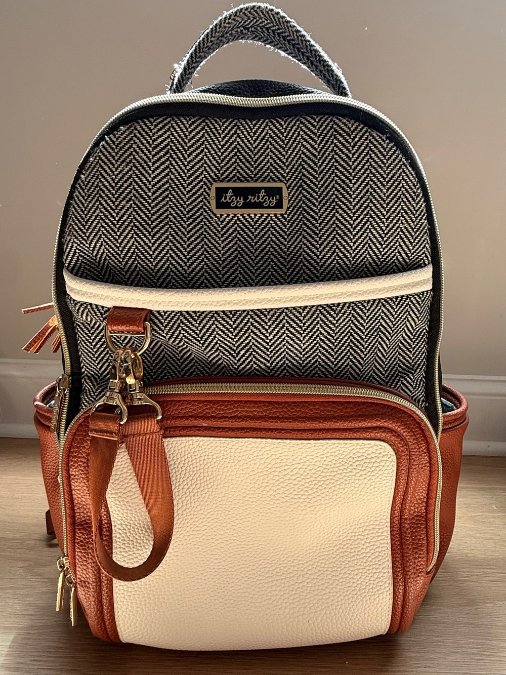 Itzy Ritzy Black Herringbone Backpack with Cream & Tan Accents